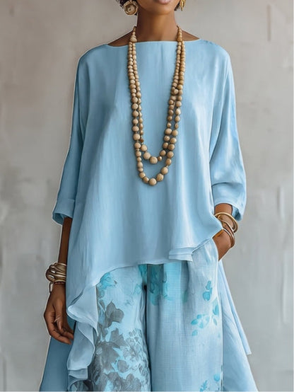 Rosalia | Completo con Top Asimmetrico in Chiffon e Pantaloni Floreali a Gamba Larga